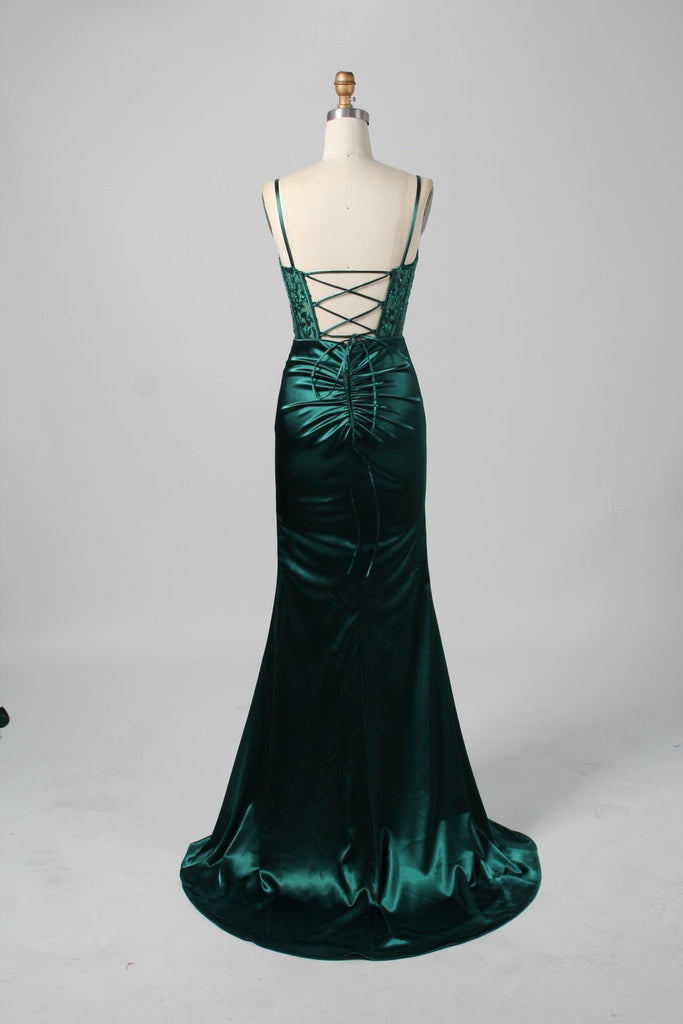 Back of green corset freyer dress. With tie-back detail.