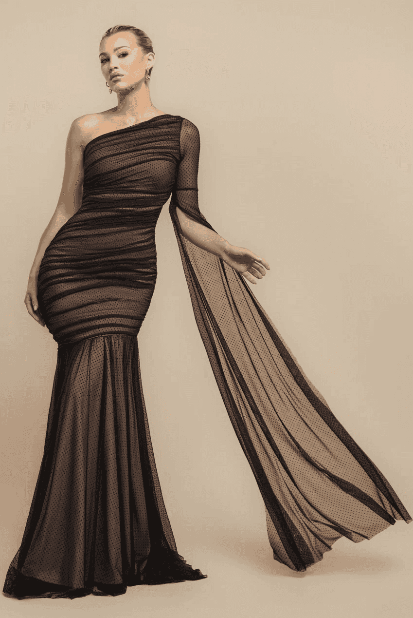 Goddiva Maxi Dress - One Shoulder Mermaid in black dobby mesh with angel wing sleeve and tulle skirt, perfect for formal or red carpet events.