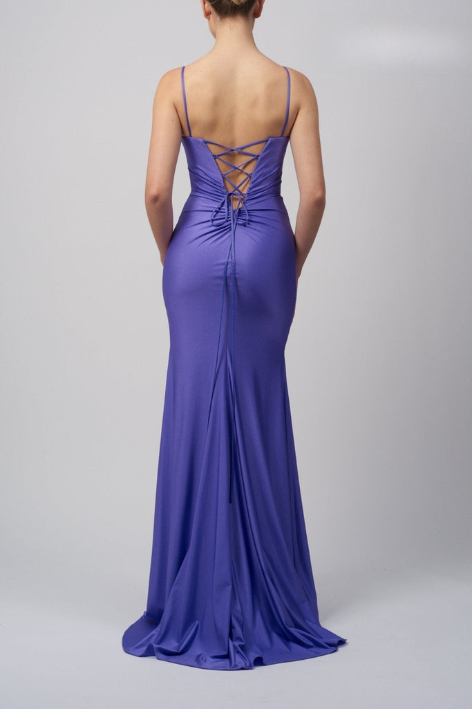 lady wearing a purple lace-up back evening dress with rouching