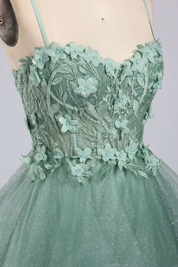 Close-up of Jessica Stuart Sage Gown bodice with intricate 3D floral appliqué and embroidered lace detail, perfect for prom or bridesmaid looks.