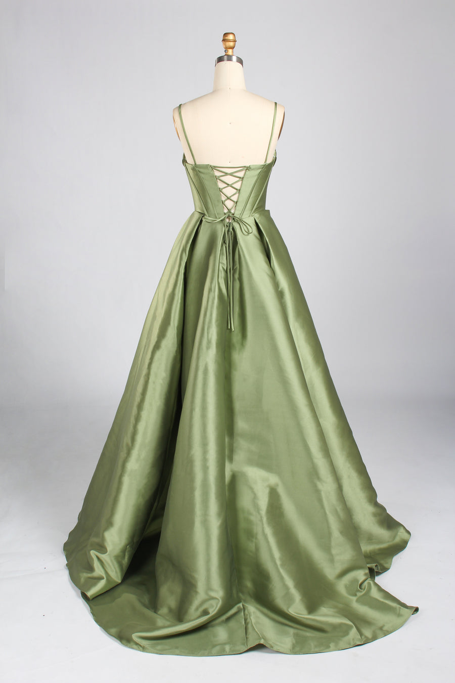 Back view of Jessica Stuart Sage Satin Strapless Phoebe Prom Gown 33213B featuring lace-up corset closure and flowing satin train for prom or evening wear.