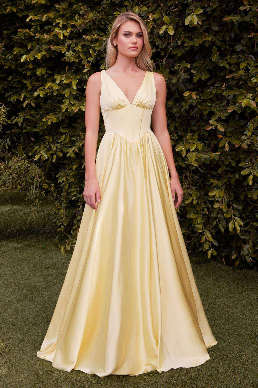 Pale yellow A-line satin gown with V-neckline and structured corset bodice, ideal for spring weddings or formal gatherings.