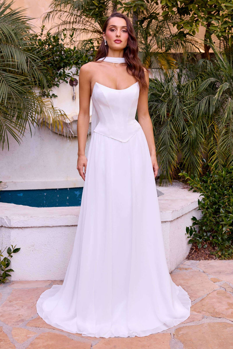 Elegant Strapless Corset Gown by Ladivine featuring a curved neckline and structured bodice, perfect for weddings or formal events. Flowing white fabric adds timeless charm.