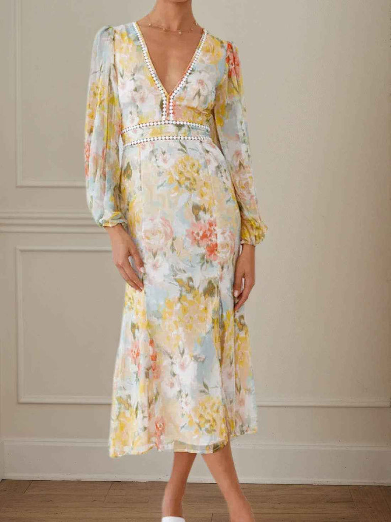 Front view of Floral Maxi Dress - Boho V-Neck Chiffon with flowy silhouette and floral print, great for travel or wedding guest outfits.