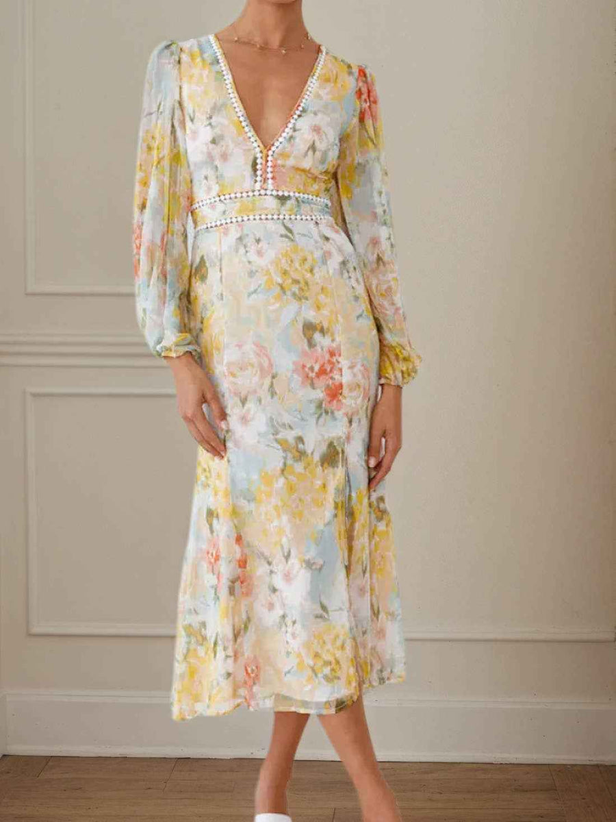 Front view of Floral Maxi Dress - Boho V-Neck Chiffon with flowy silhouette and floral print, great for travel or wedding guest outfits.