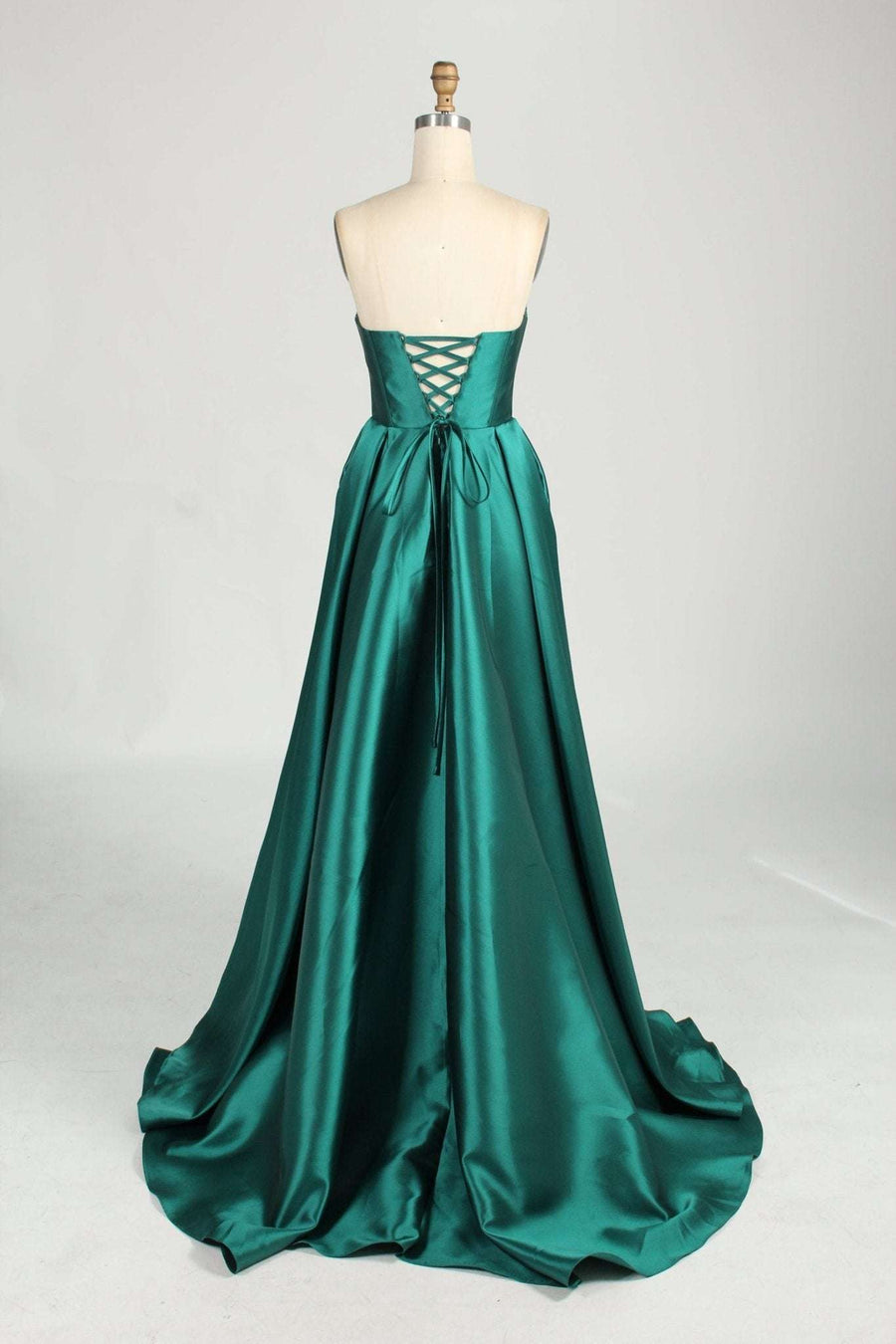 Carmen ball gown lace-up back detail in emerald green satin