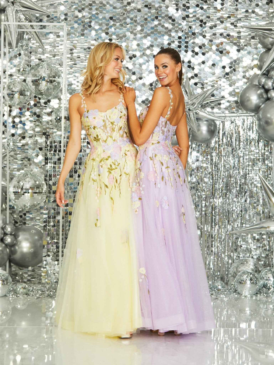 Back view of Tiffanys Flora Lilac and Yellow Ballgowns with floral straps and flowing skirts, ideal for summer balls or weddings.