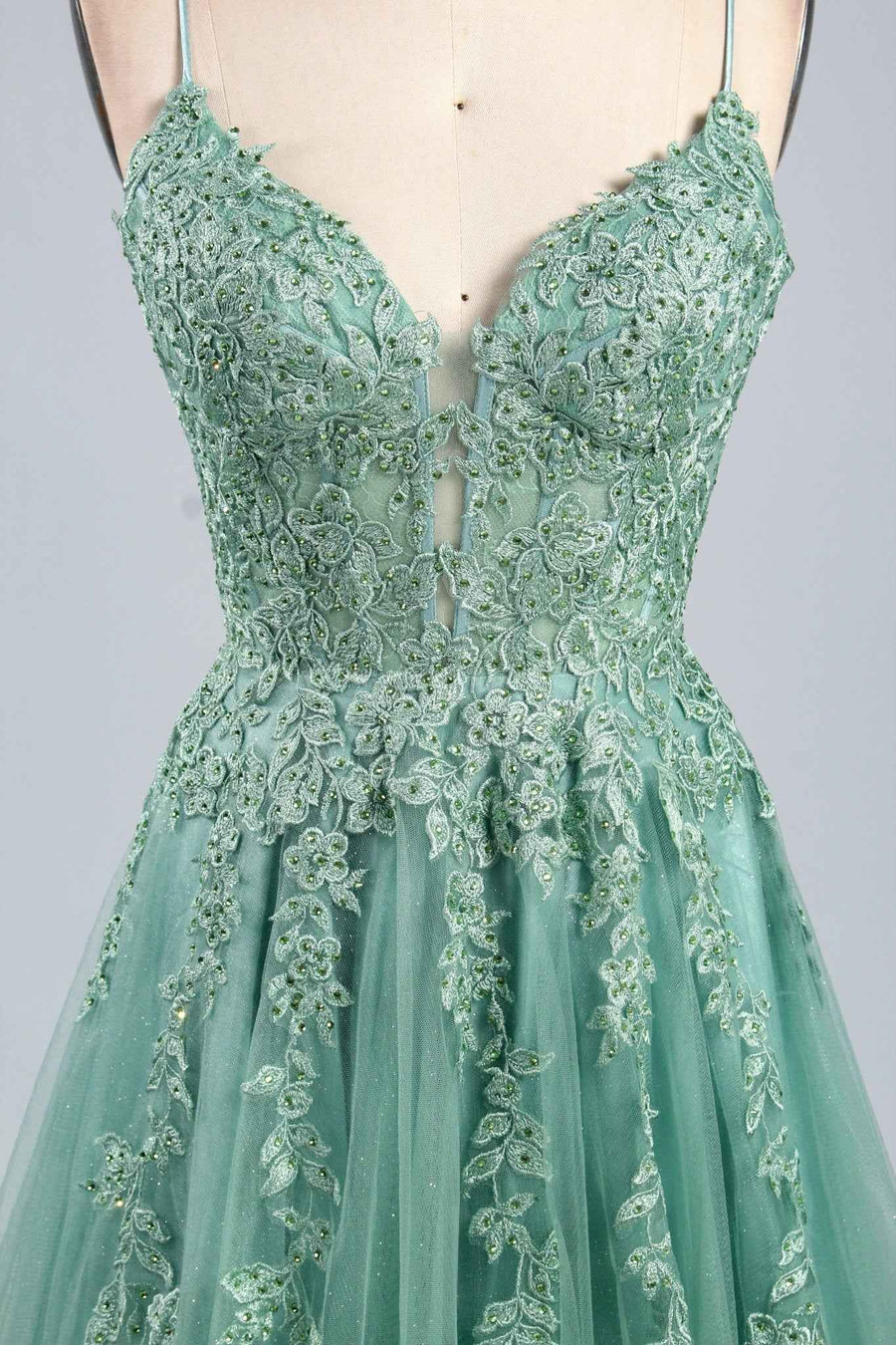 Joy Sage Green Floral Applique Tulle Ballgown by Jessica Stuart with intricate embroidered lace and glitter details, ideal for prom or black tie gala.