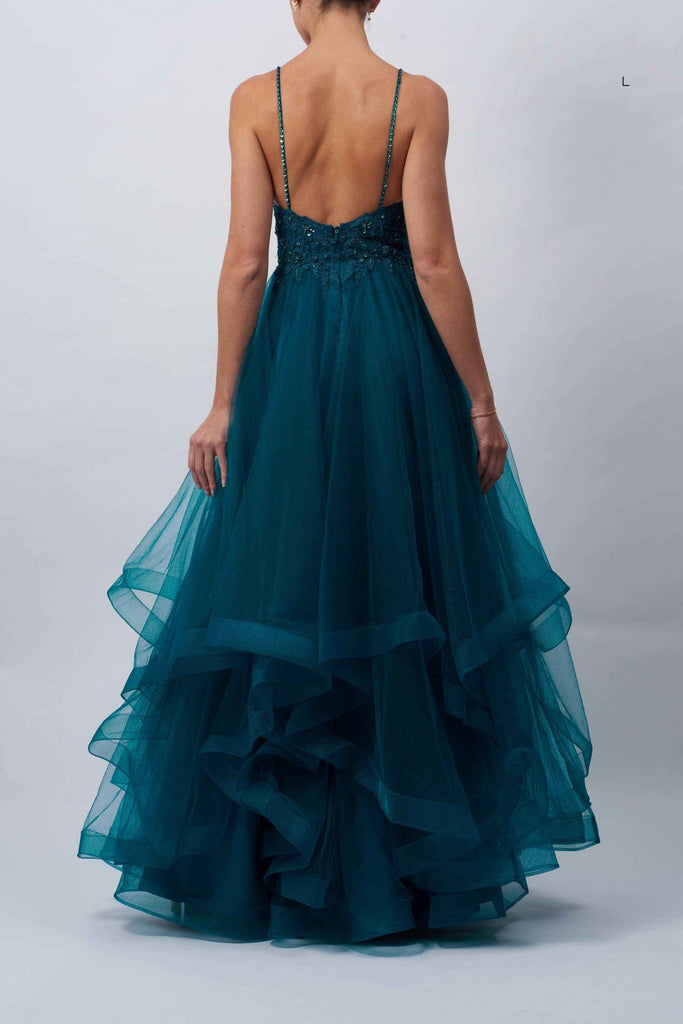 Back view of teal Mascara MC110117 prom dress with low scoop back, sparkle straps, and voluminous tiered tulle skirt. Perfect for evening elegance.