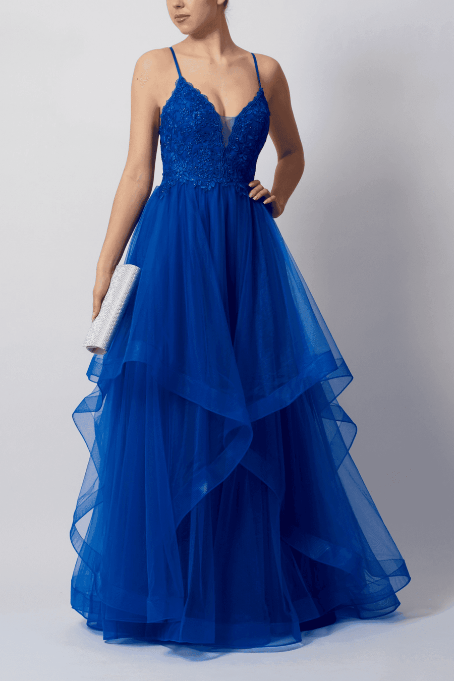 Mascara MC110125 royal blue tulle ballgown with criss cross back, lace bodice, and layered skirt, ideal for prom or black tie events.