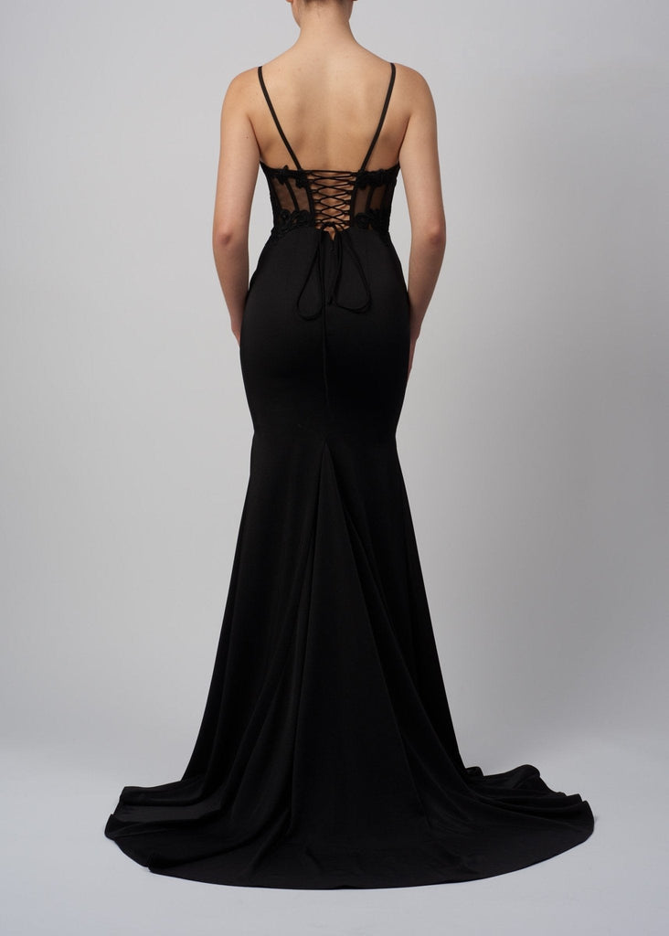back view of fitted black corset dress