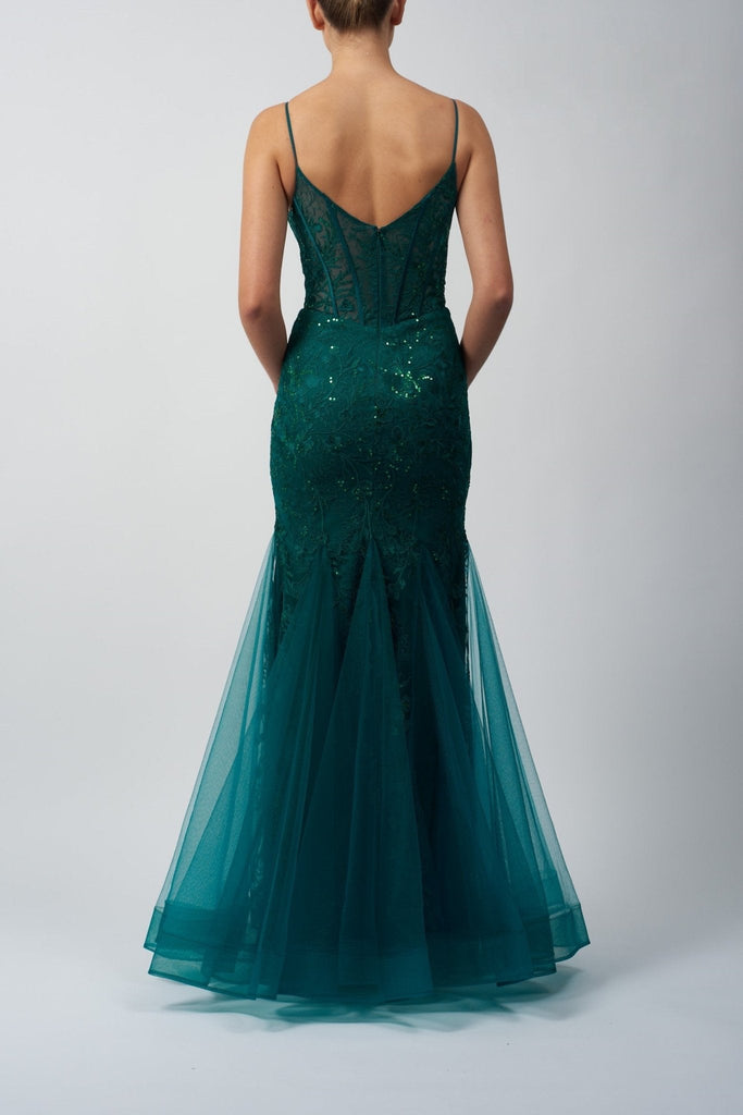 back view of a model in a green mermaid lace dress 