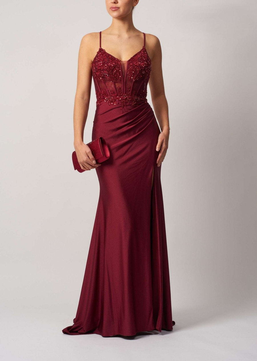 Mascara MC11324 Wine Corset Fitted Prom Dress with embellished bodice, sheer corset top, and thigh-high slit, perfect for prom or black-tie events.