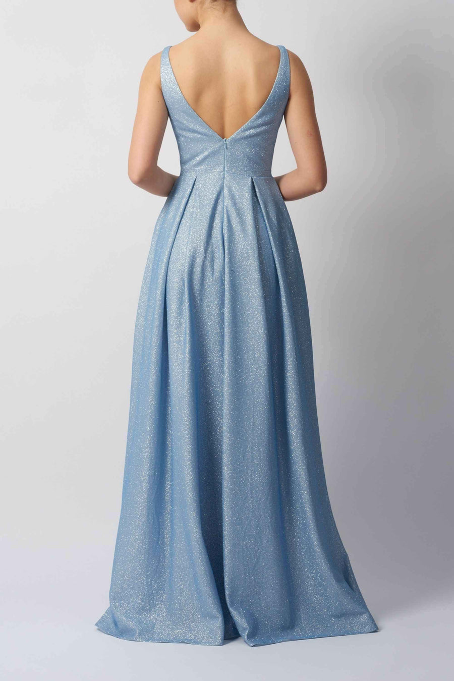Back view of light blue Mascara London MC113441 Sparkle Evening Gown showing V-back and flowing pleated skirt for a graceful formal look.