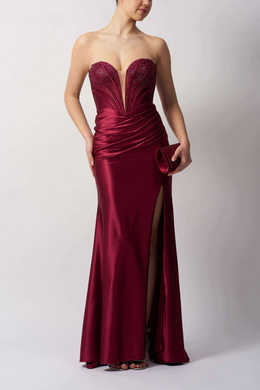 Strapless Plunge Dress - Mascara Prom Dress MC113443 in deep red with beaded bodice, ruched detailing, and elegant thigh slit for prom or red carpet.