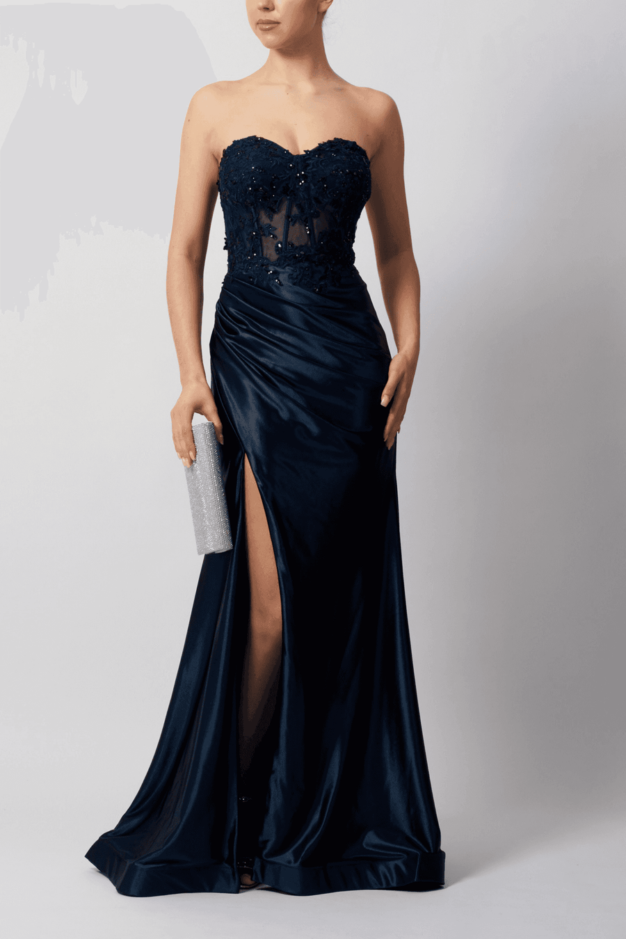 Mascara MC11421 features beaded embellishments, strapless corset bodice, and high leg split for a red carpet-ready look.