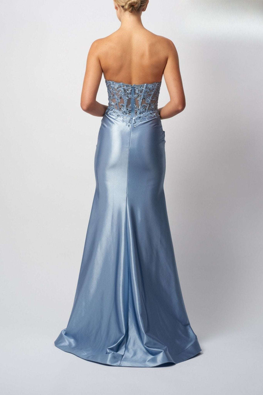 Back view of Mascara MC11421 Ink Blue Prom Dress featuring beaded lace bodice and satin finish. Strapless design ideal for prom or black tie events.