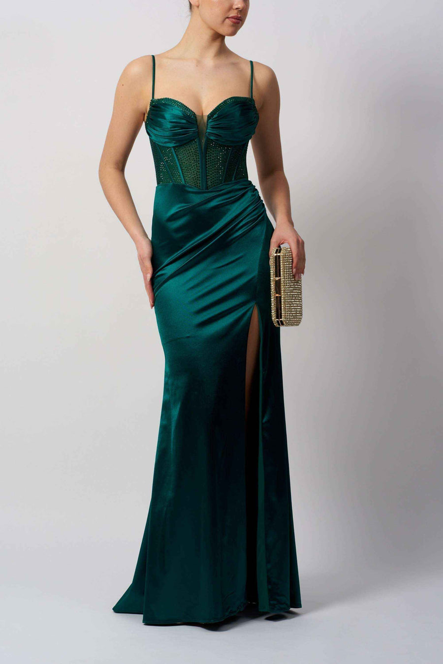Emerald green Mascara MC11434 HOT FIX Jersey gown with structured beaded corset and high slit, combining elegance and glamour for special events.