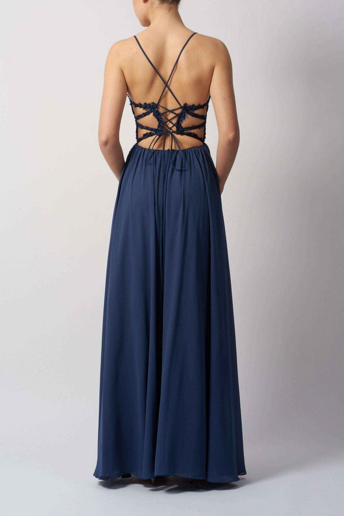 Back view of Mascara Chiffon Prom Dress in navy blue showing intricate crisscross tie back detail. Stylish and adjustable fit for formal events.