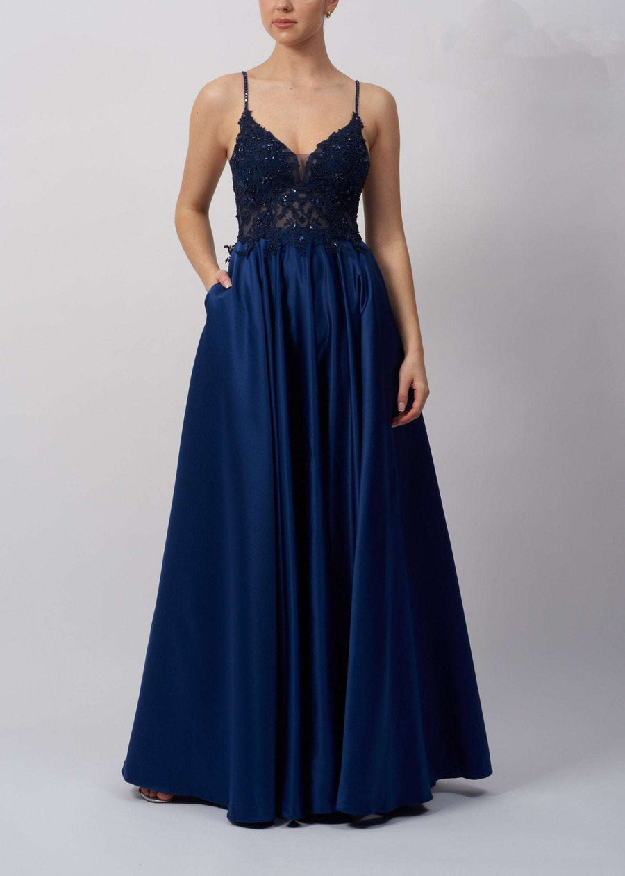Navy Satin Prom Dress - Mascara MC123218 with lace bodice, spaghetti straps, and full-length skirt featuring hidden pockets. Elegant evening gown for prom.