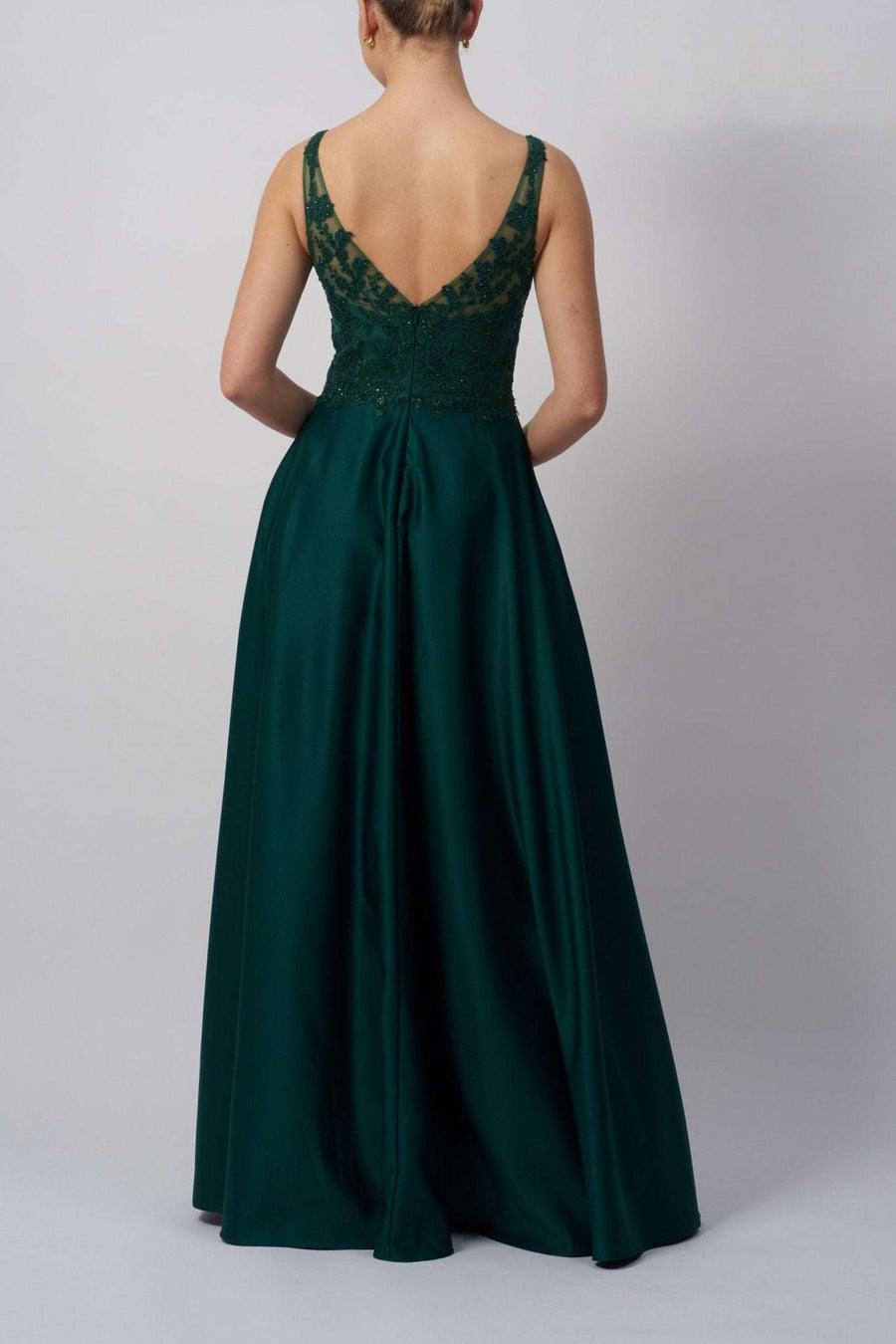 Back view of Mascara London MC123414 Forest Green Satin Ballgown featuring a deep V-back and lace bodice. Elegant choice for formal occasions.