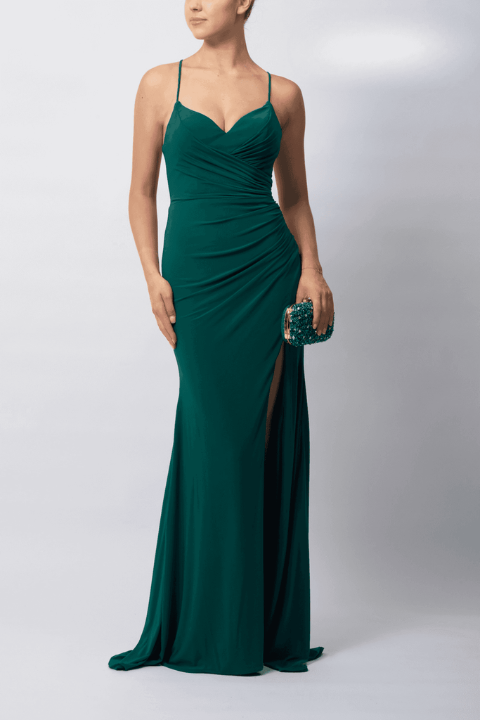 Mascara London Prom Gown MC18332 in forest green with ruched jersey fabric, fitted silhouette, and thigh-high slit. Ideal for prom or black-tie events.