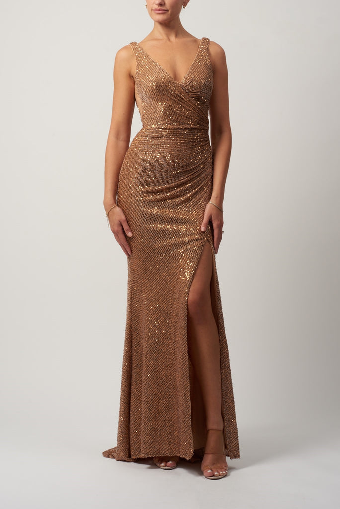 model in bronze long sequin dress
