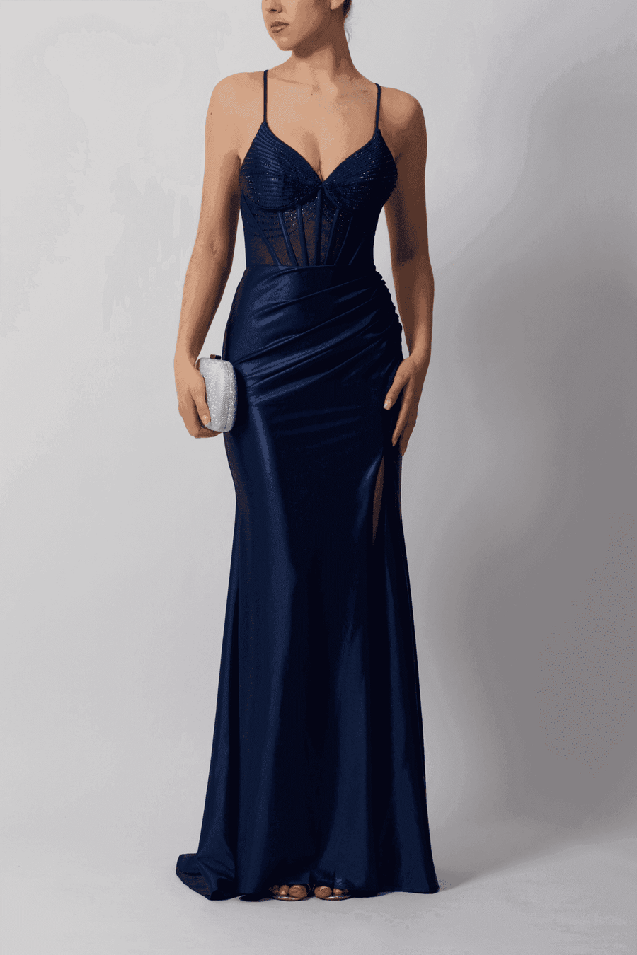 Navy fitted evening gown with beaded corset bodice, ruched jersey skirt and side split, perfect for summer formal events