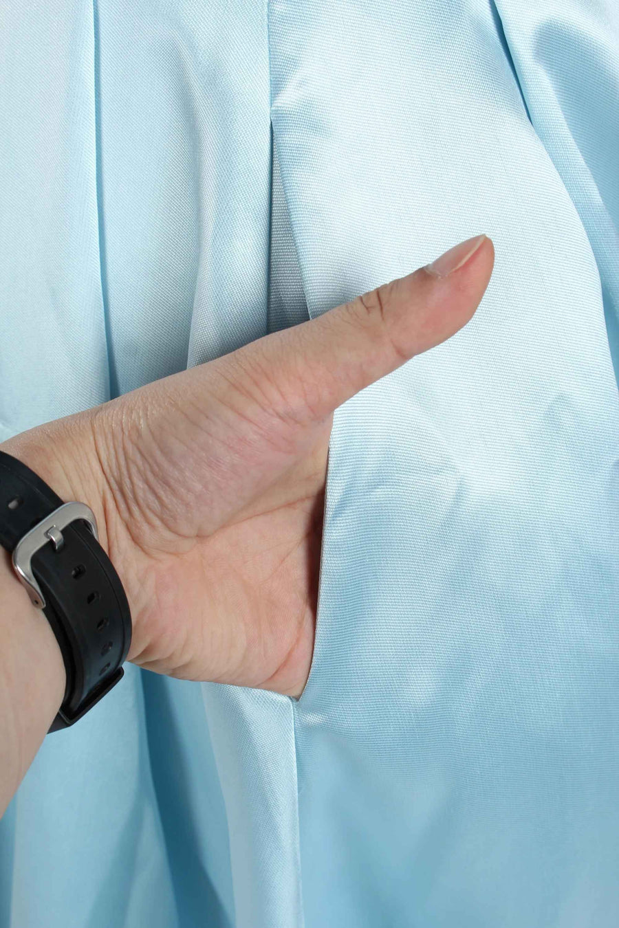 Functional pocket detail shown on the Jessica Stuart Light Blue Satin Phoebe Prom Gown, combining style with practicality.