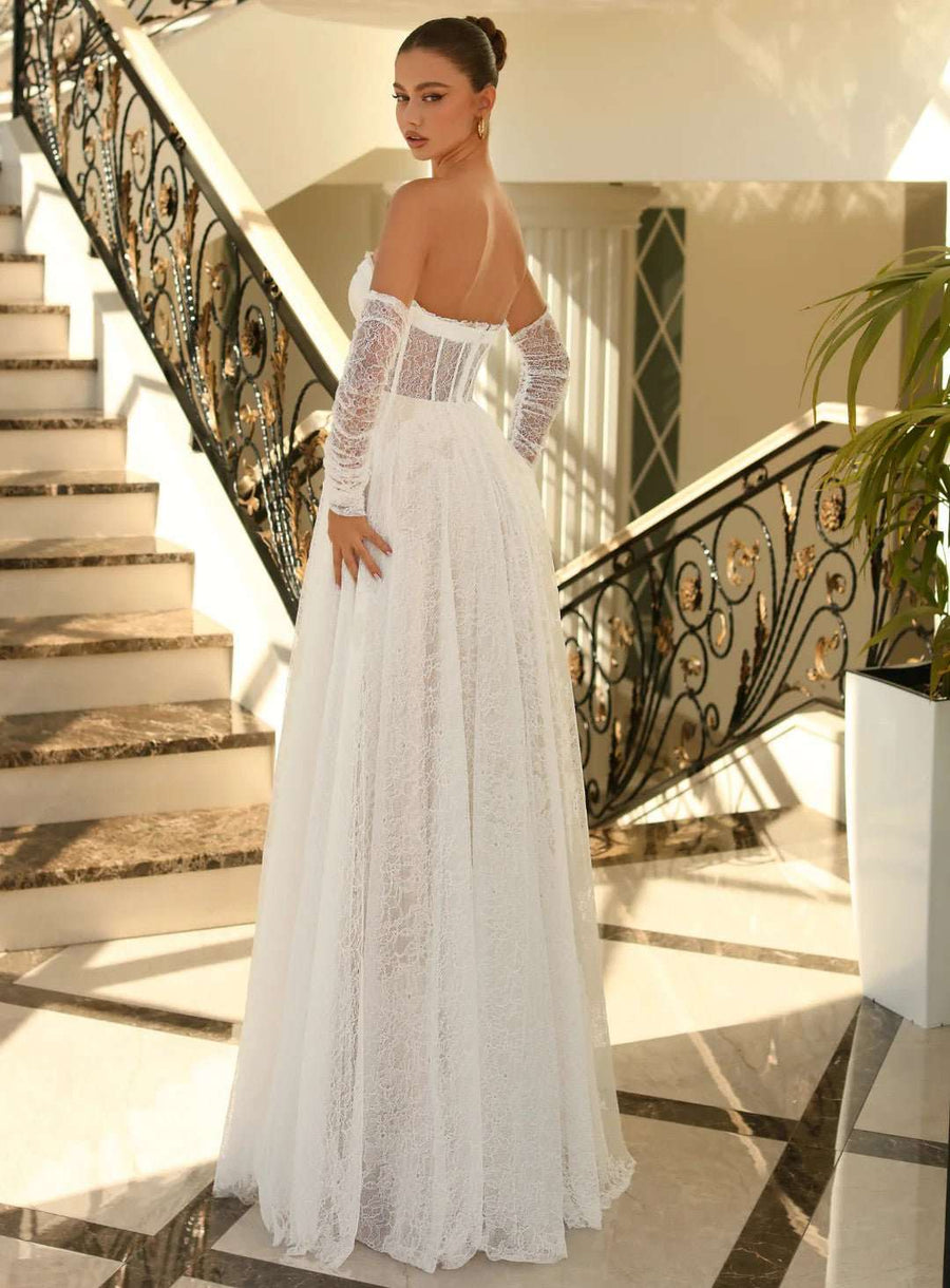 Ivory strapless lace ballgown NC1005 with sheer long sleeves and corset bodice, perfect for weddings or formal bridal occasions.