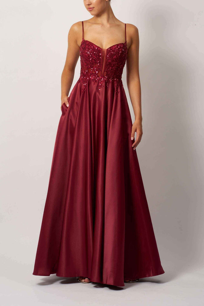 Elegant burgundy Beaded Satin Gown featuring a sequin-embellished bodice and flowing skirt, perfect for red carpet or evening occasions.