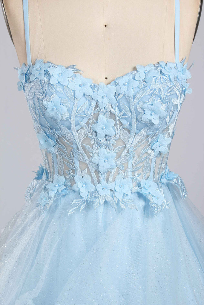 Jessica Stuart 3D Flowers Gown with lace bodice and floral appliqués, featuring a tiered tulle skirt ideal for quinceaneras and formal events.