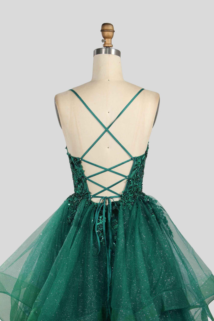 Back view of Jessica Stuart Hailey Tiered Ruffled Ball Gown 33231 in green with lace-up straps and glitter tulle layers. Ideal for quinceanera boutiques.
