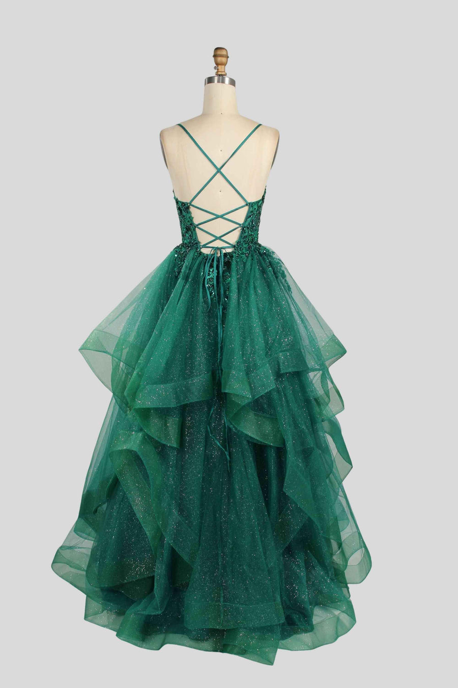 Back view of Jessica Stuart Hailey Tiered Ruffled Ball Gown 33231 in glittery green tulle with lace-up corset. Ideal for quinceanera or prom events.