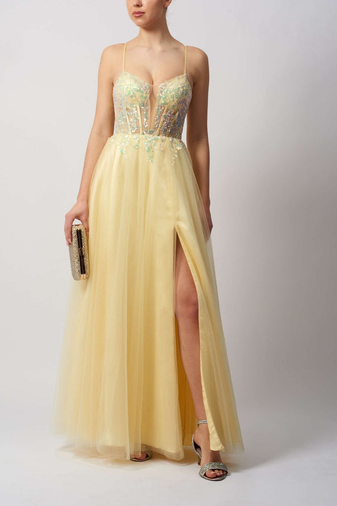 Mascara Lemon Tie Ballgown with tulle skirt and sequin bodice, featuring a thigh-high slit and tie-back design for proms and formal events.