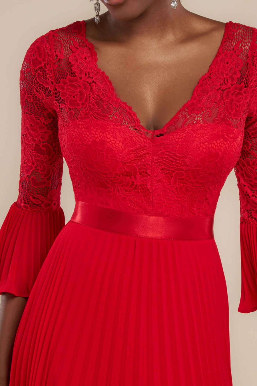 Scalloped Lace Maxi Dress in red with pleated chiffon skirt and satin waistband, featuring a V-neck and 3/4 lace sleeves. Elegant A-line cut ideal for formal events.