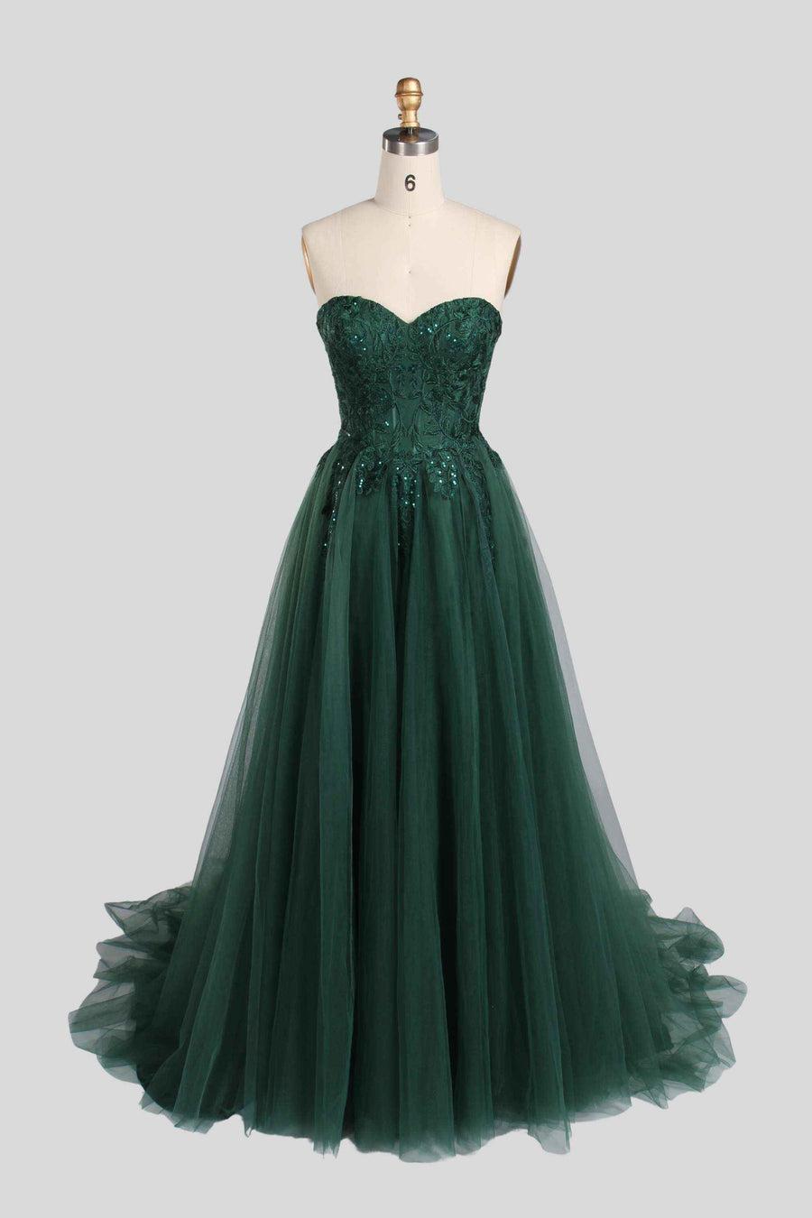 Jessica Stuart Luna strapless sequin ballgown in emerald green with sweetheart neckline and layered tulle skirt, ideal for prom or evening events.