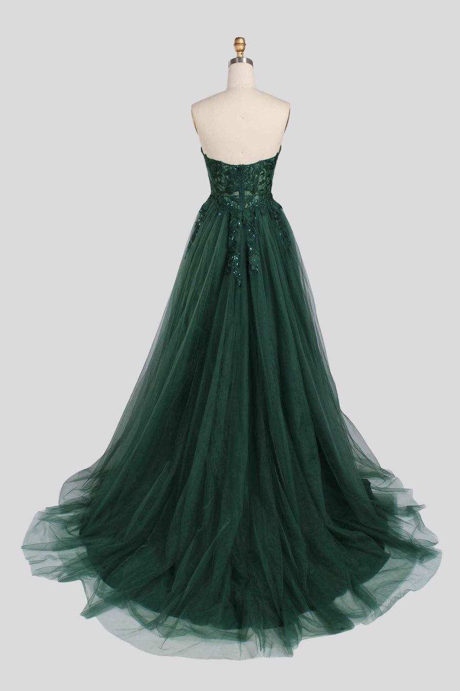 Back view of Jessica Stuart Luna strapless sequin ballgown in emerald green with flowing tulle skirt, ideal for prom or evening events.