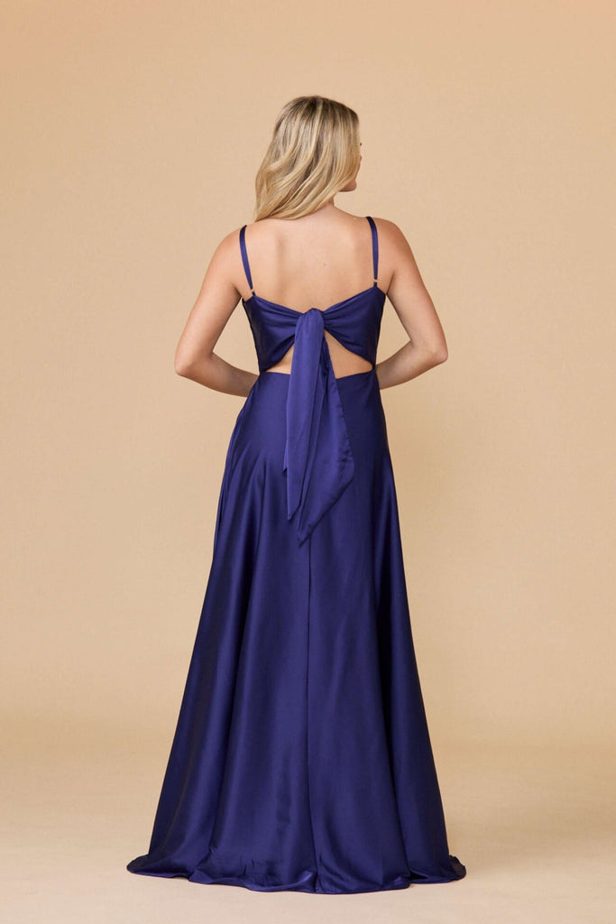 Back view of navy satin prom dress with tie-back detail and cut-out design. Elegant and modern for formal occasions or red carpet events.
