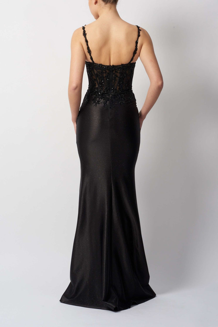 Back view of MC119528 Black Beaded Jersey Dress by Mascara featuring a fitted silhouette and elegant beaded detailing.