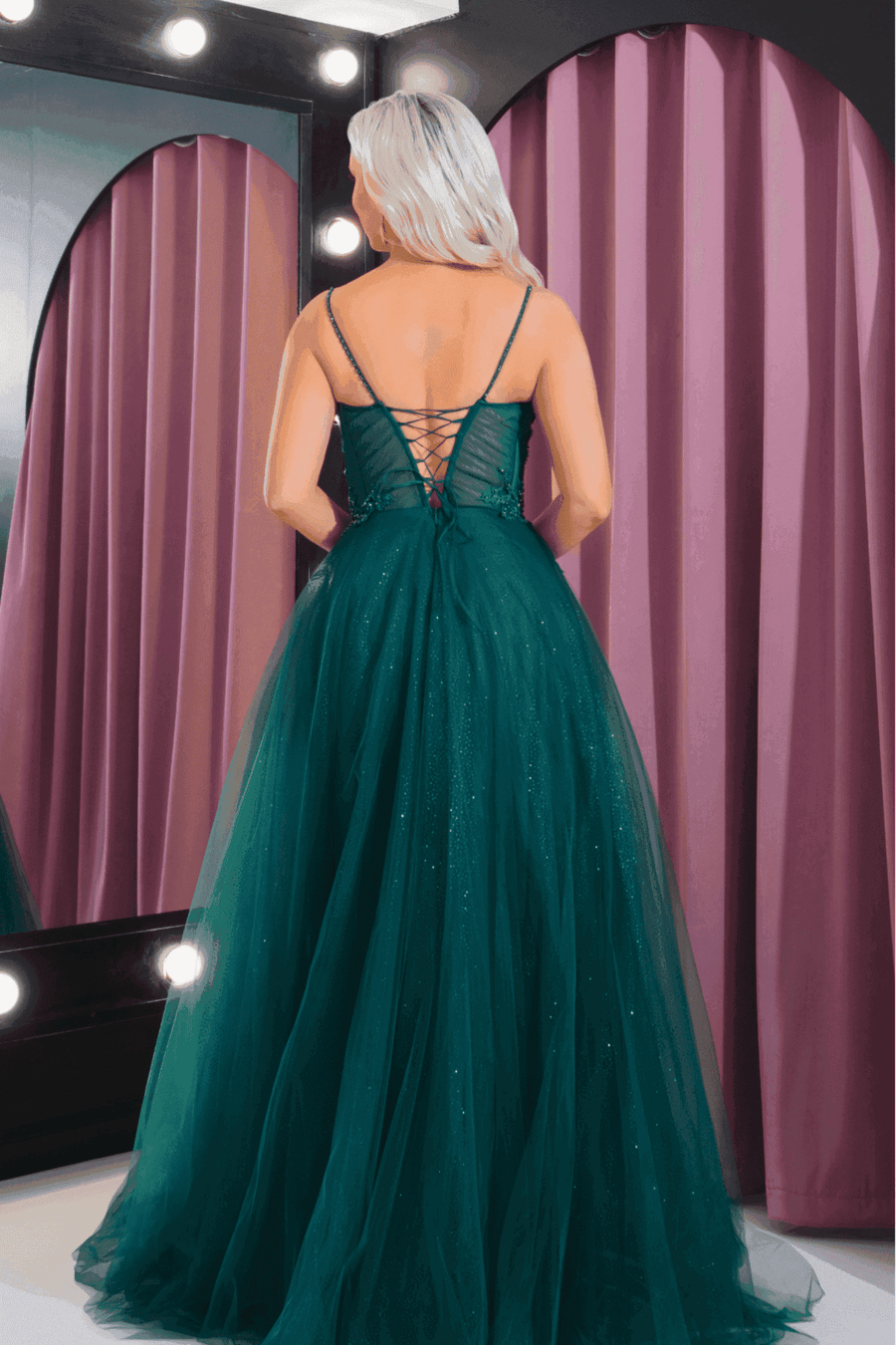Back view of Lulu tulle corset prom dress with lace-up closure and flowing full skirt, ideal for formal events and prom nights.