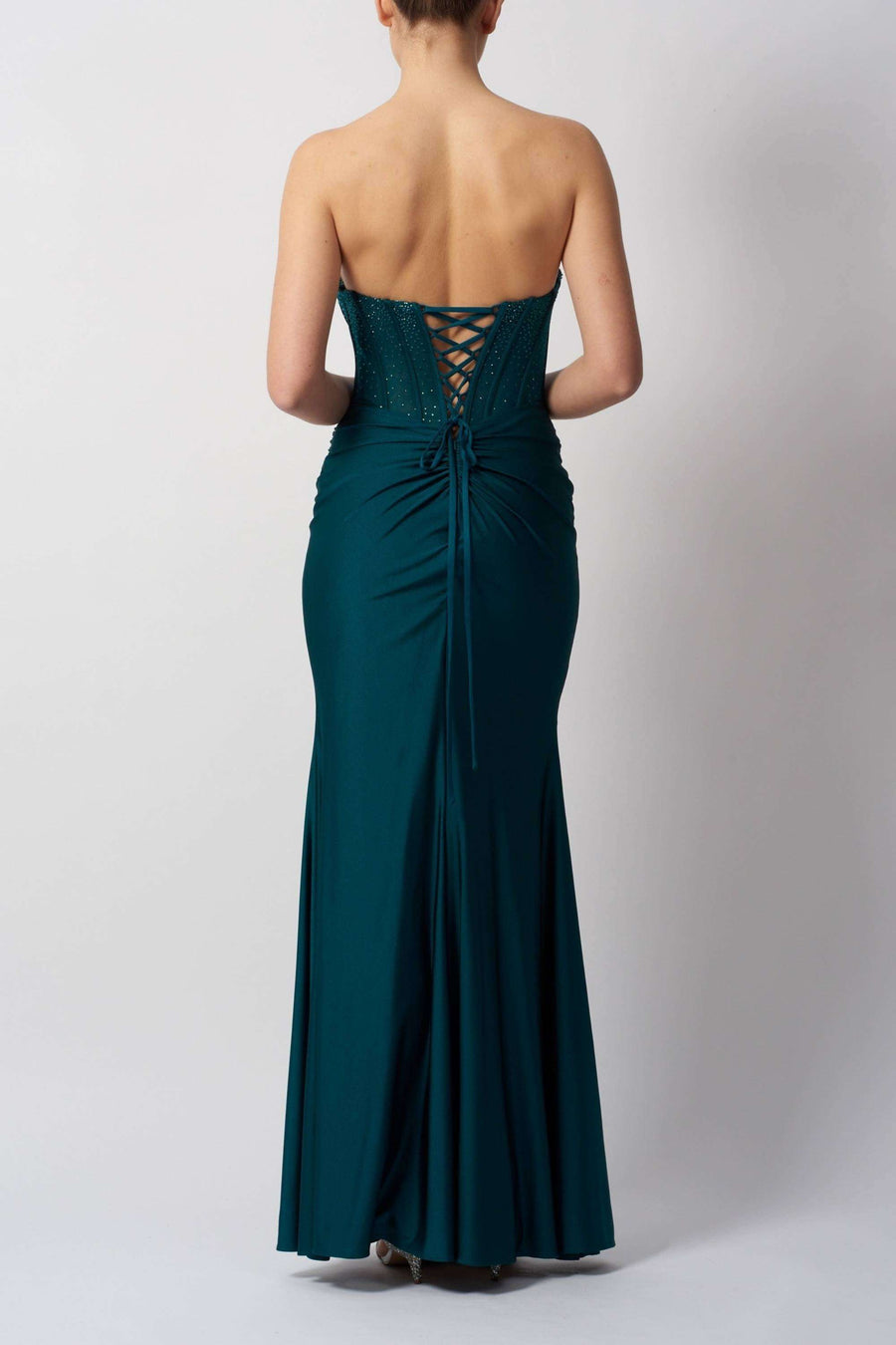 Back view of Petrol Blue Corset Prom Dress featuring lace-up corset detail and ruched back design, perfect for formal events and prom nights.
