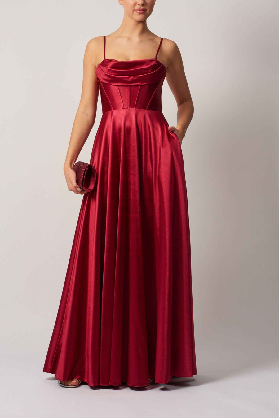 Mascara Berry Prom Dress with cowl neckline and A-line silhouette in satin fabric, featuring hidden pockets and spaghetti straps.