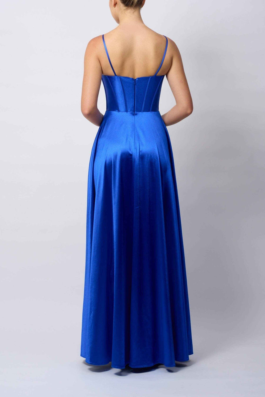 Back view of Mascara A-Line Prom Dress in royal blue satin, showcasing zip closure, spaghetti straps, and flowing skirt design.