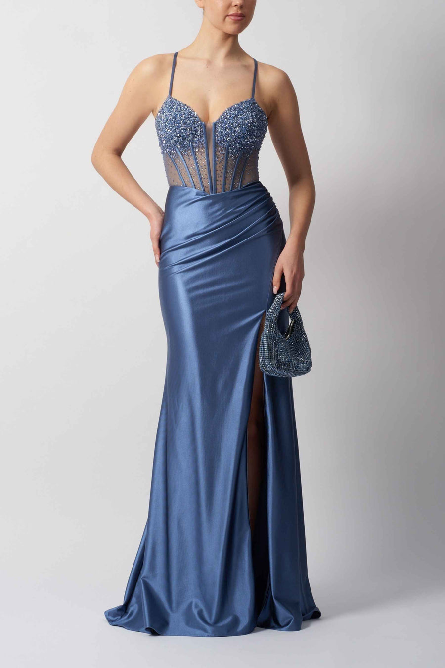 Petrol prom dress with beaded sweetheart bodice, satin skirt, and thigh-high slit. Ideal for red carpet or evening events.