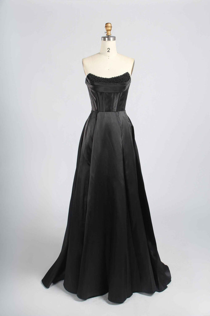 Jessica Stuart Black Pearl Gown in satin with strapless sweetheart neckline and flowing A-line silhouette, ideal for formal evening events.