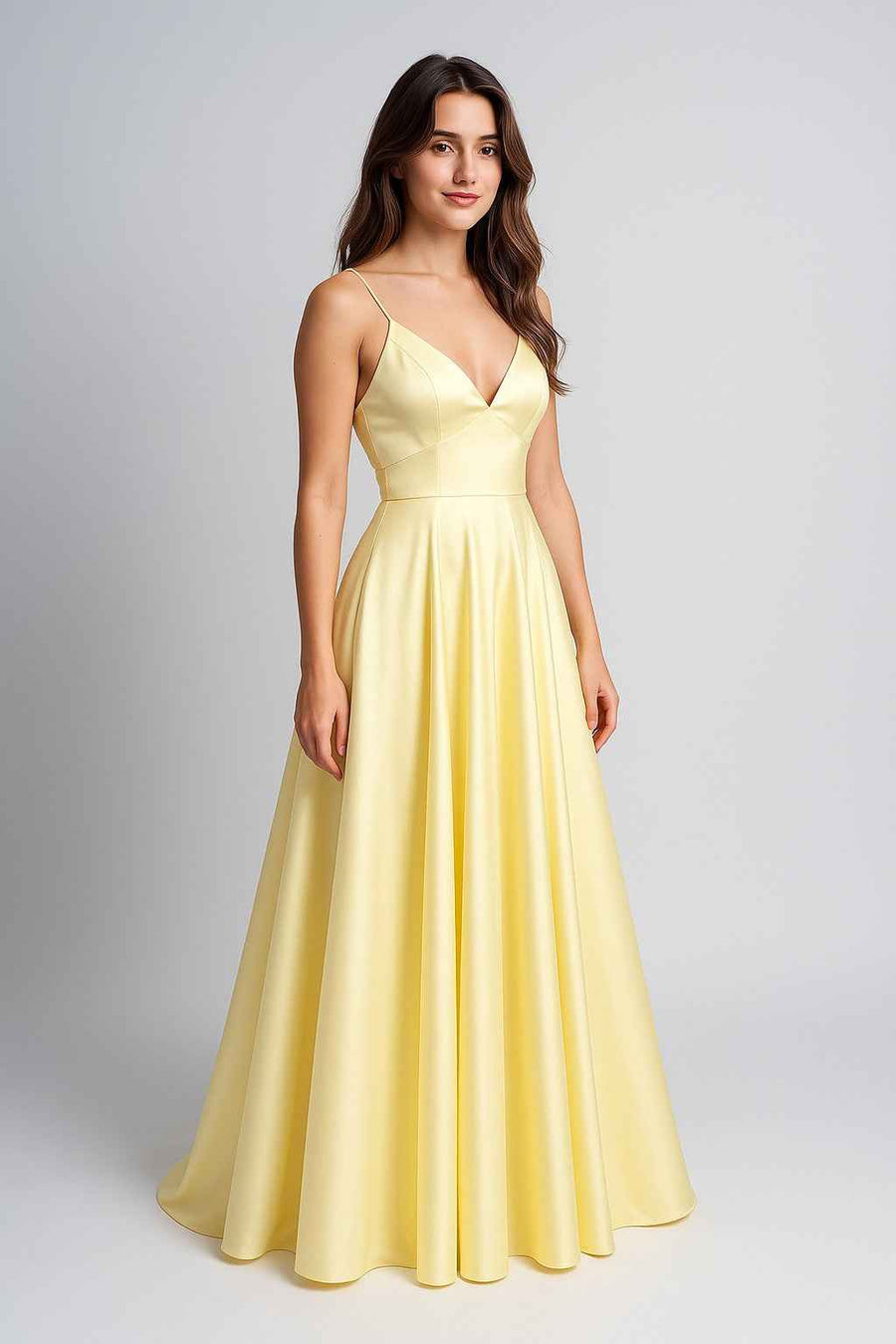 Ava Light Yellow Satin Ballgown with Pockets by Jessica Stuart featuring a V-neckline, spaghetti straps, and full satin skirt for prom or evening wear.