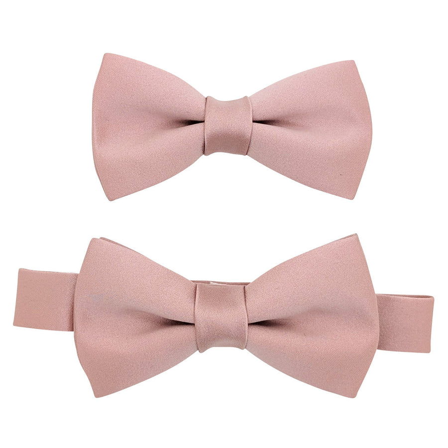Set of two suede pink boys bow ties with adjustable and elastic neckstraps, perfect for ages 4 to 12. Pre-tied and made of polyester.
