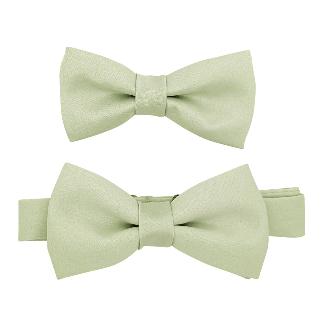 Set of two Willow Bow Ties for Boys in sage green, showcasing size variety for matching sibling or group wedding accessories.