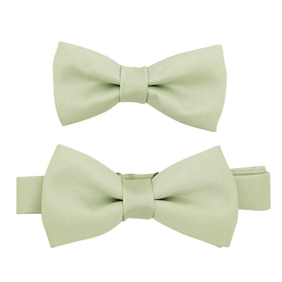 Set of two Willow Bow Ties for Boys in sage green, showcasing size variety for matching sibling or group wedding accessories.